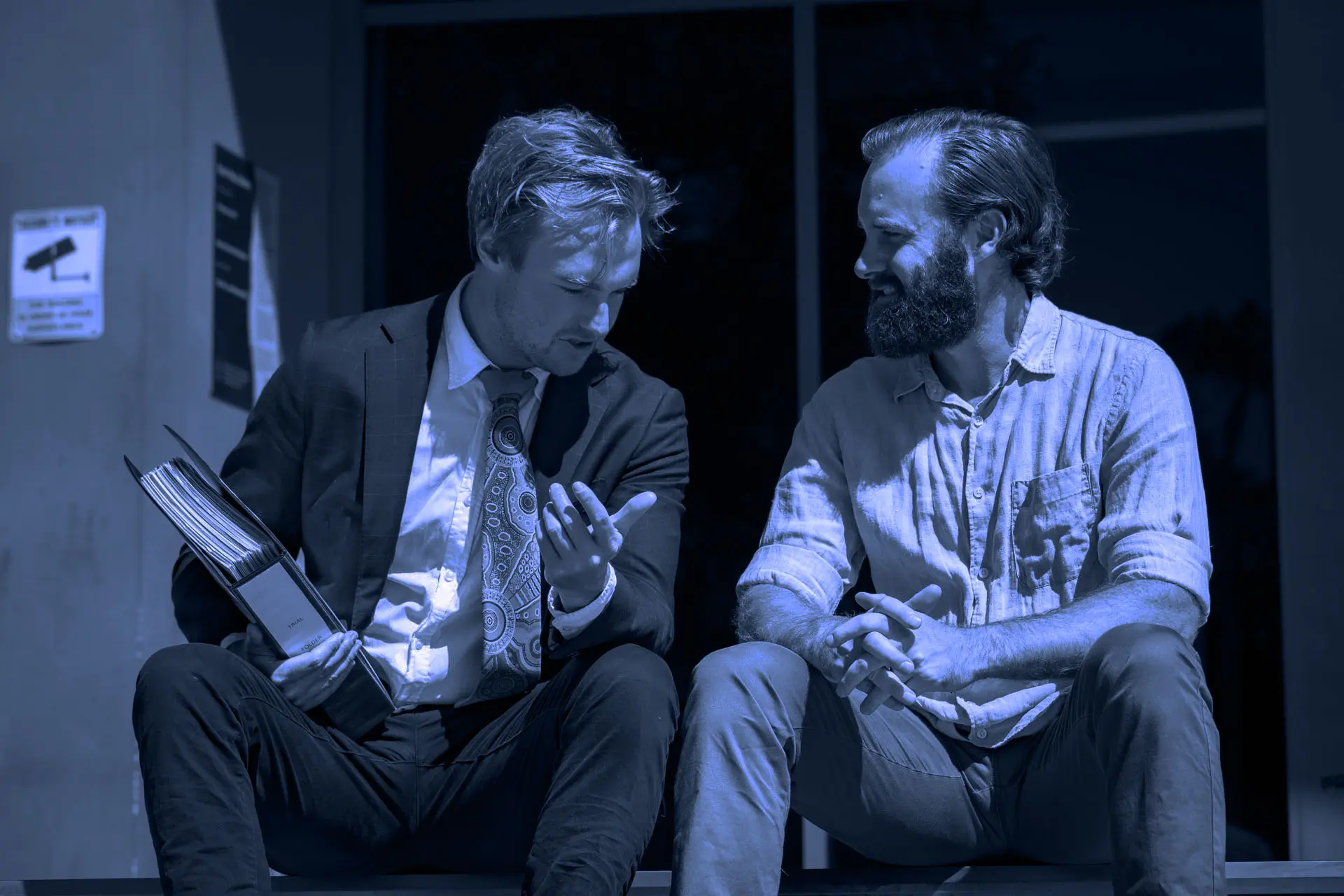 Spice Law Xavier Lawyer Talking To Client About A Case